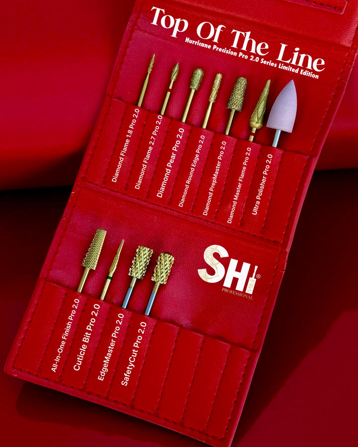 Set of gold diamond coat Hurricane Precision Russian Manicure E-Bit Kit with a red leather case labeled 'Top Of The Line' and 'SHi®' brand on a red background.