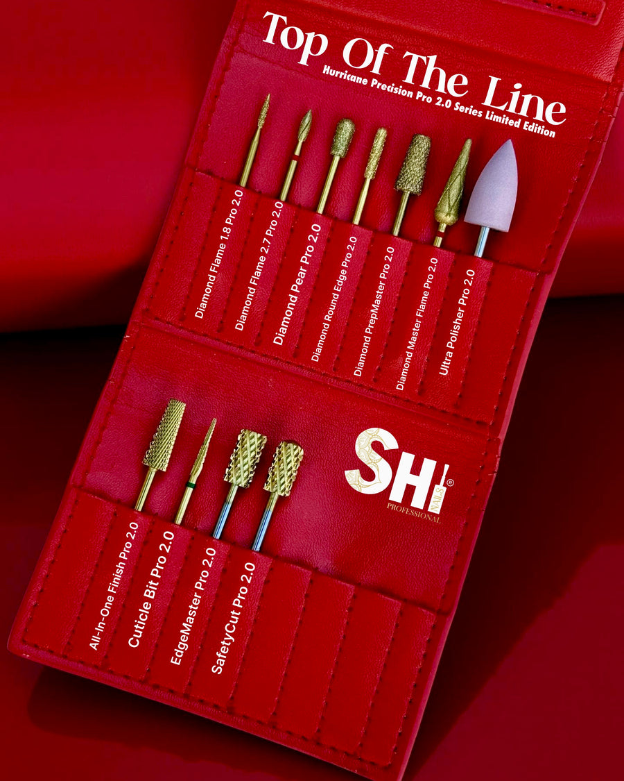 Set of gold diamond coat Hurricane Precision Russian Manicure E-Bit Kit with a red leather case labeled 'Top Of The Line' and 'SHi®' brand on a red background.