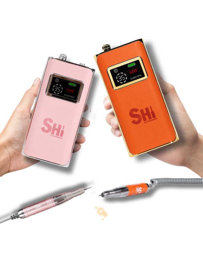 Two portable electric handheld devices, one pink and one orange, with 'SHi' branding, held by hands on a white background.