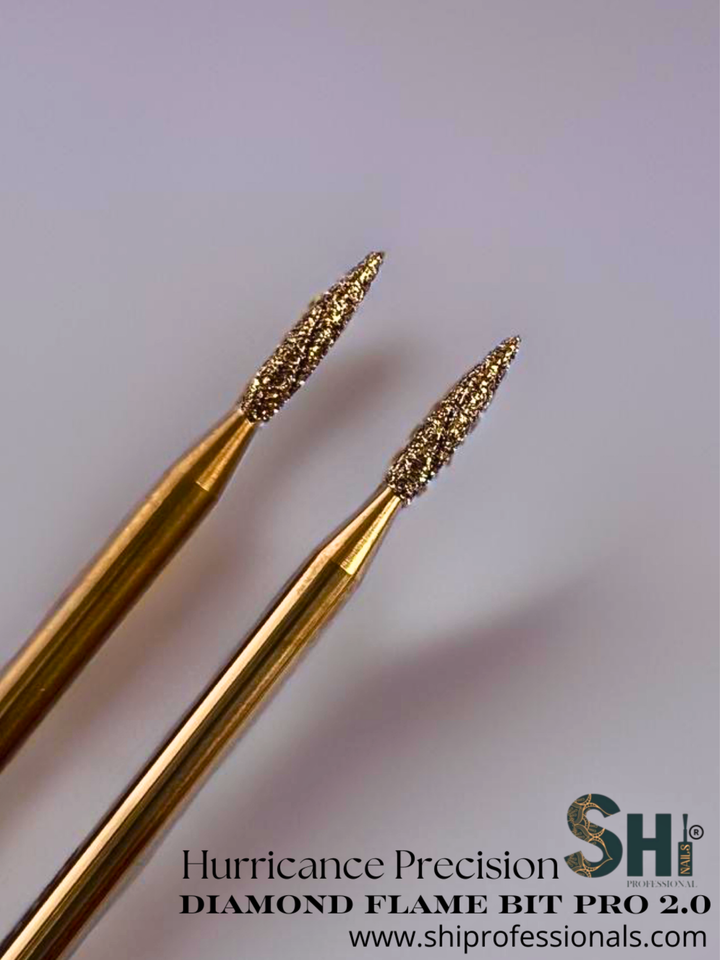 Two gold-colored diamond flame bits on a light background with SHI logo and text.