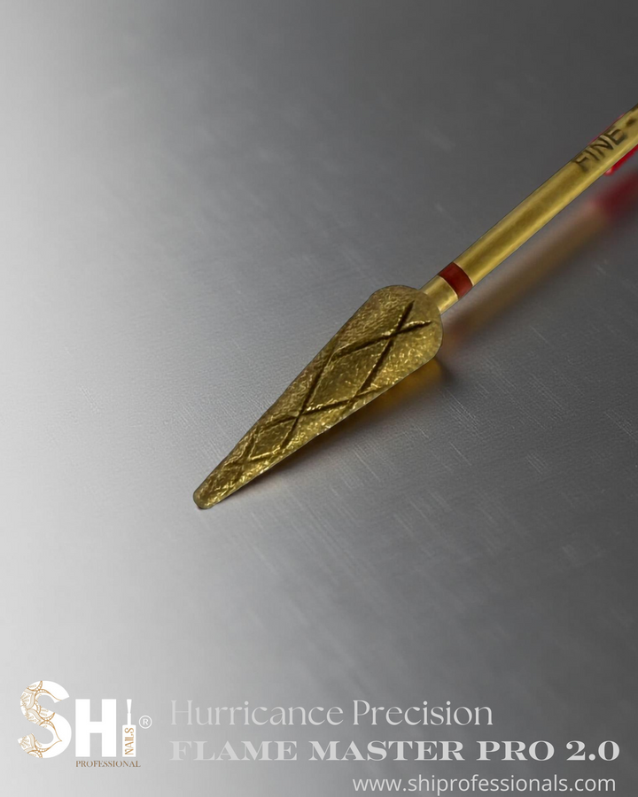A gold flame master pro 2.0 bit on a metallic surface with SHI logo 'Hurricane Precision' branding