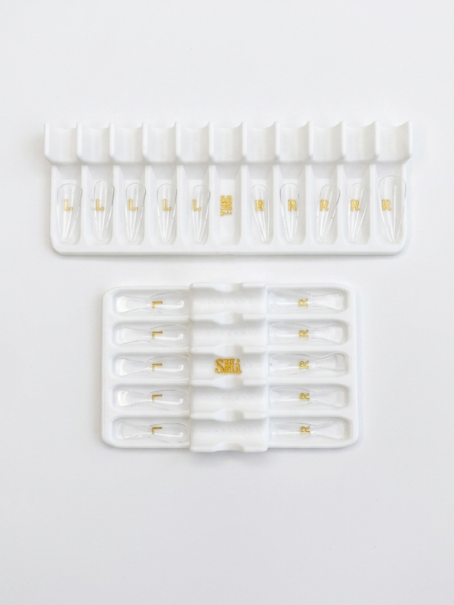 Set of white prep caddy with gold text on a soft white background