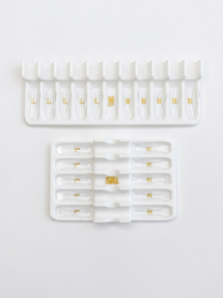 Set of white prep caddy with gold text on a soft white background